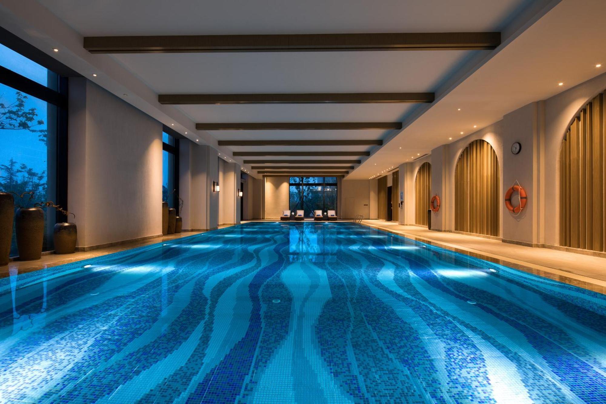 Hotel Crowne Plaza QingdaoOrientalMovieMetropolis Esterno foto
